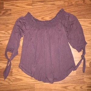 Cute off the shoulder shirt.